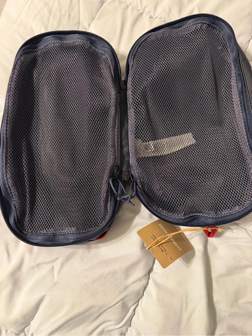 Patagonia Black Toiletry Bag with Blue Logo and Red Trim